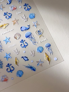 Détail de stickers 5D en relief pour ongles avec étoiles de mer et méduses