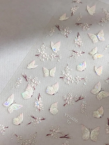 Macro detail of 3D embossed laser butterfly and cherry blossom nail art sticker YT5486
