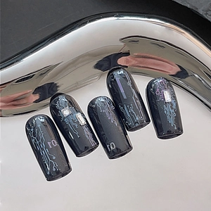 Cyberpunk nail stickers with black circuit board pattern and silver rhinestones