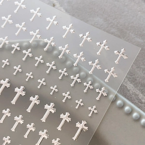 Silver cross nail art stickers with embossed chrome hearts style on transparent sheet