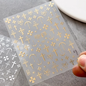 Gothic gold and silver cross nail stickers with heavy metal winged heart patterns YT4384