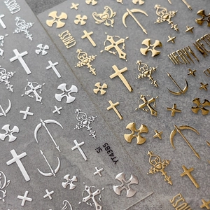 Gothic gold and silver cross nail art stickers with retro heavy metal lettering designs
