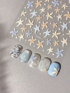 Macro shot of ocean themed starfish nail stickers and application on various nail tips