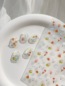 Detailed view of summer nail stickers featuring 3D relief ice cream and watermelon patterns