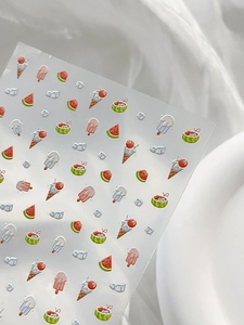 Detail of 3D embossed nail art stickers with summer ice cream and watermelon patterns