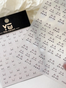 Close-up of cute cartoon cat facial expression nail art stickers on YT5586 backing card