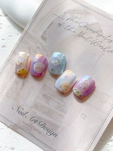 Détail d'autocollants pour ongles mouton aurore avec illustrations sur carte de présentation