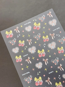 Detailed 3D embossed nail stickers featuring sweet cherry bows and pink lace hearts