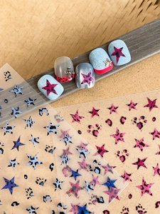 Detail of leopard star nail stickers YT5825 on nail tips with mixed colors and patterns