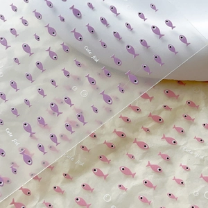 Cute cartoon fish nail art stickers in purple and pink tones with Cute Fish text