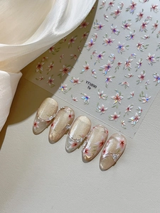 Detailed view of YT5890 Te floral nail stickers with iridescent shimmer and gradient petals