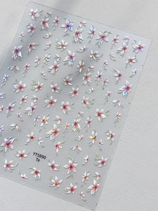 Macro shot of YT5890 shell-style floral nail stickers with holographic laser finish