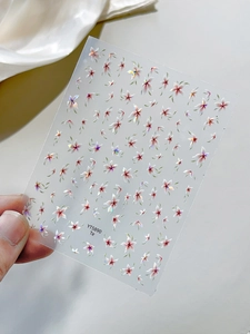 Detail of YT5890 holographic floral nail stickers with pink 3D shell luster flowers