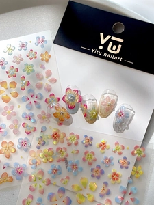 Detailed 3D embossed shell flower nail stickers with macaron gradient and pearl finish