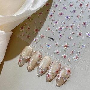 Floral shell glitter nail art stickers with 3D pink white flowers on sparkling almond nails