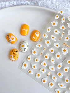 Detail of YT5261 embossed fried egg nail stickers with cute omelette and bow designs
