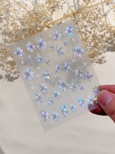 Detailed macro view of YT5428 Pro laser floral nail stickers with purple pearlescent finish