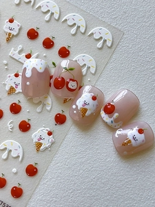 Detail of 3D embossed dog and cherry nail stickers with cute cream patterns