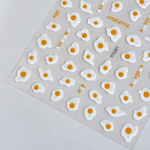 Cute 5D embossed fried egg nail art stickers with white and yellow cartoon designs