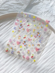 Macro detail of laser iridescent nail stickers with cute bow and heart patterns