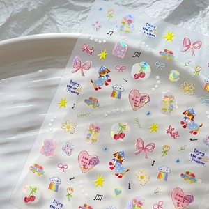 Colorful holographic bow and heart nail art stickers with cute cartoon puppy designs