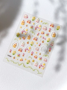 Detail of YT5928 embossed nail art stickers featuring cute yellow ducks and flowers