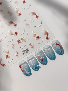 Detailed 5D embossed nail art stickers featuring red and white koi fish and pearls