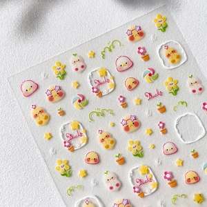 Cute cartoon yellow duck embossed nail art stickers with daisies and stars on white background