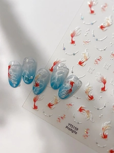 Detailed 3D relief nail stickers featuring koi fish and pearls on blue gradient nails