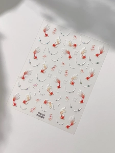 Detail of 5D embossed koi fish nail stickers with pearl strings and water droplets