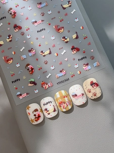 Detail of 3D embossed nail stickers featuring cute cartoon dachshund and puppy motifs