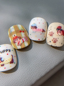 Close-up of cute cartoon dachshund nail art stickers with embossed cherry and puppy patterns