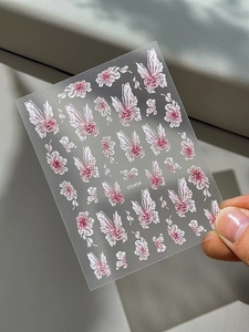 Detailed 5D embossed nail art sticker featuring pink floral and butterfly patterns
