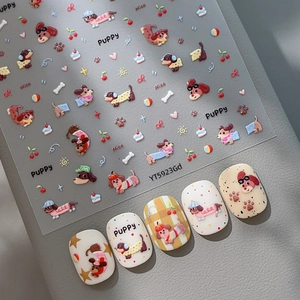 3D embossed cute puppy nail stickers with dog, cherry, and heart motifs on a sheet