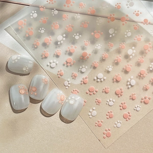 Cute pink cat paw nail stickers with 3D embossed texture for minimalist DIY manicure art