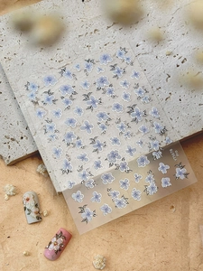 Detailed view of floral nail stickers YT5678 Pro with 3D pearls and metal accents