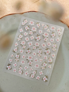 Detail of YT5676 double-layered floral nail stickers with gold outlines and pink petals