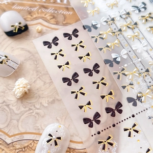 Lot de stickers d'ongles à nœuds 3D avec motifs en relief noirs, dorés et argentés