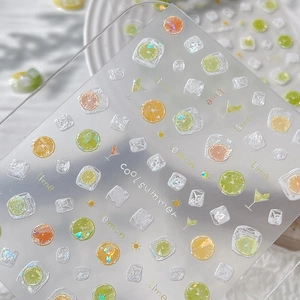 Sparkling lemon and lime nail stickers with glitter for refreshing summer nail art designs