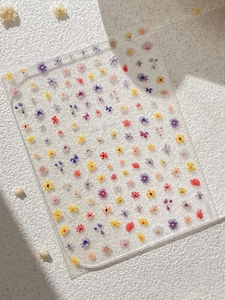 Macro detail of YT5440 embossed wild flower nail art stickers with colorful patterns