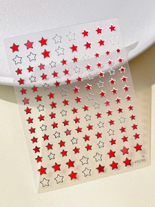 Detailed view of YT5795 nail stickers featuring red and silver metallic star patterns
