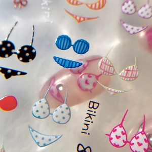Stickers nail art thème bikini avec pois et rayures colorés pour un style plage d'été