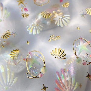 Iridescent shell nail art stickers featuring holographic sea stars and coral designs