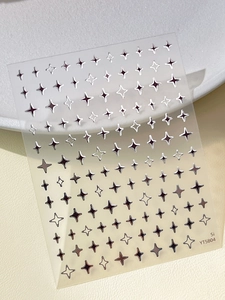 Detailed view of silver metallic star nail art stickers in various sizes model YT5804