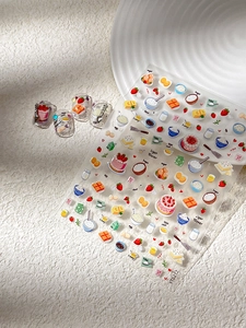 Detail of 3D embossed strawberry cake nail stickers with hand-drawn dessert illustrations