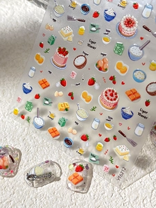 Detail of 3D embossed strawberry cake and baking theme nail art stickers with illustration