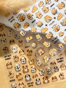 Detailed close-up of cute cartoon dog embossed nail art stickers with orange puppy designs