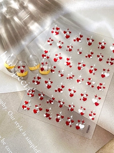 Detail of YT5693 nail stickers featuring red heart and star patterns on French manicure