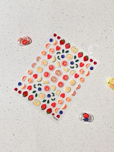 3D relief nail stickers with summer fruit patterns like strawberry and lemon on nails