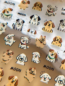 Close-up of cute 3D embossed cartoon puppy nail art stickers with breed illustrations